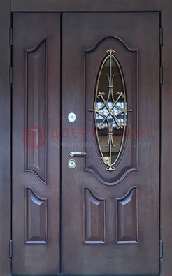 Темная металлическая дверь Винорит со стеклом и ковкой ДСК-239 в Севастополе