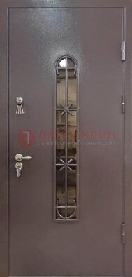 Металлическая дверь Порошок с небольшим стеклом и ковкой ДСК-282 в Севастополе
